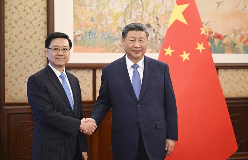 习近平听取李家超述职报告1.jpg